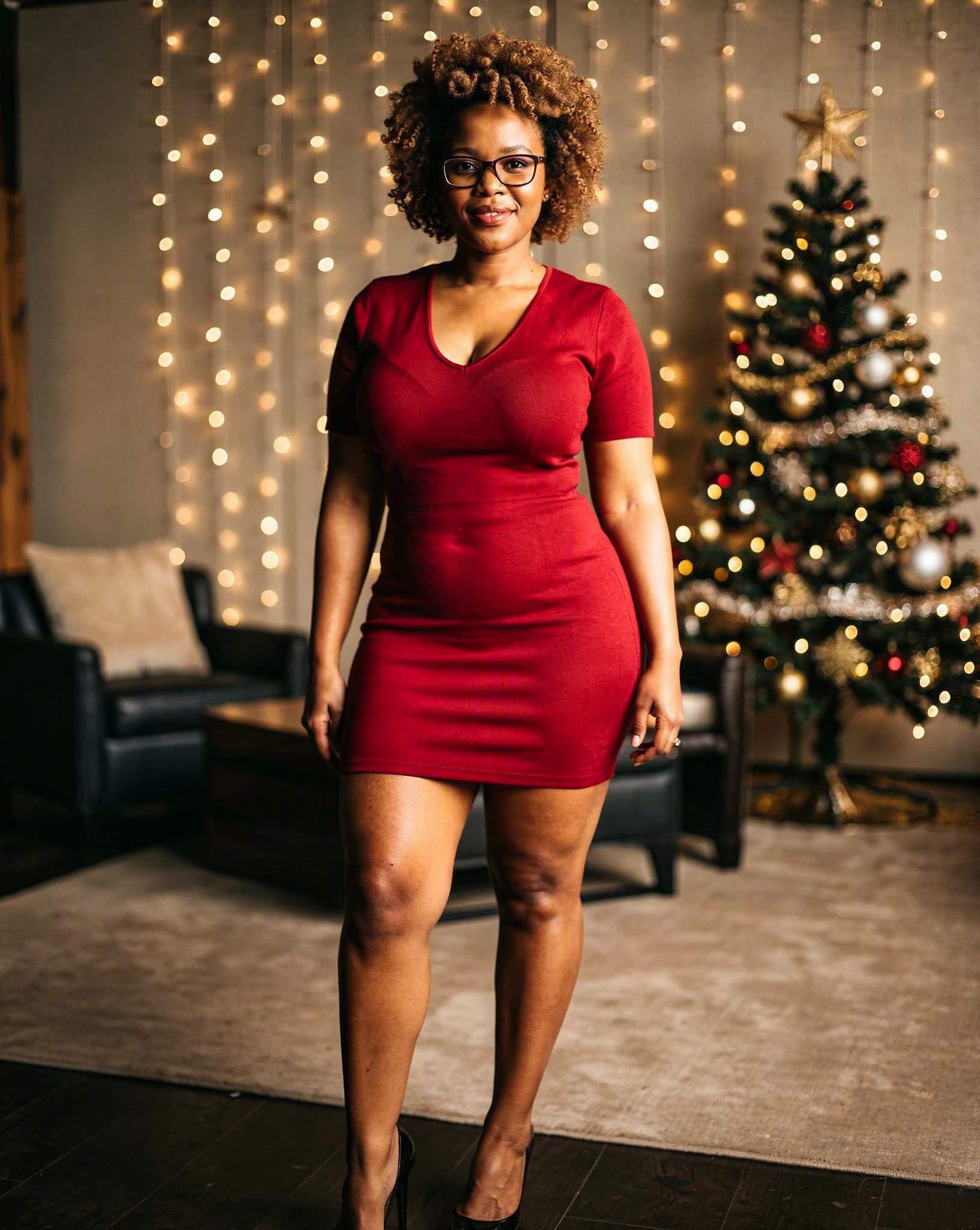 Mapule in a red cocktail dress at an office party — a No Safe Word character